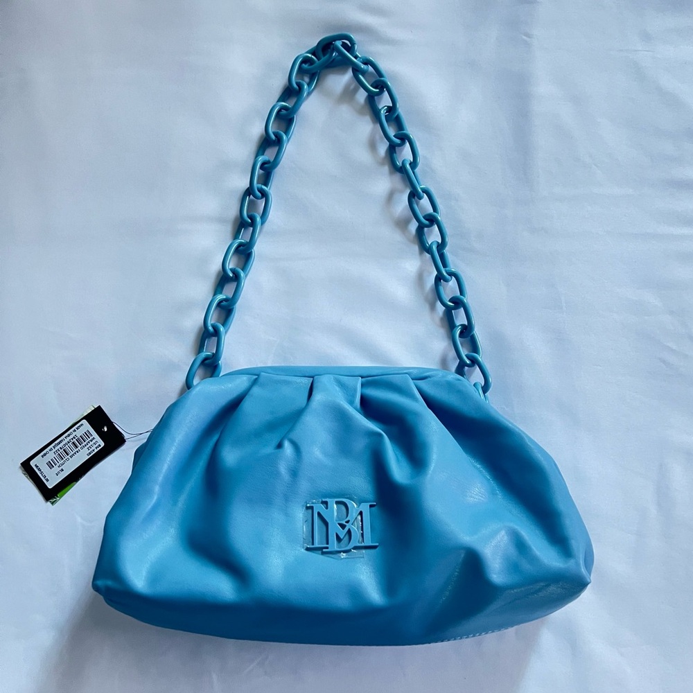 Badgley Mischka Wrapped Frame Clutch with blue chain.